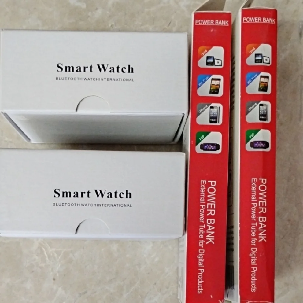 One Lot Of TWO Smart Watches & TWO Power Banks - All NIB - Picture 7 of 9